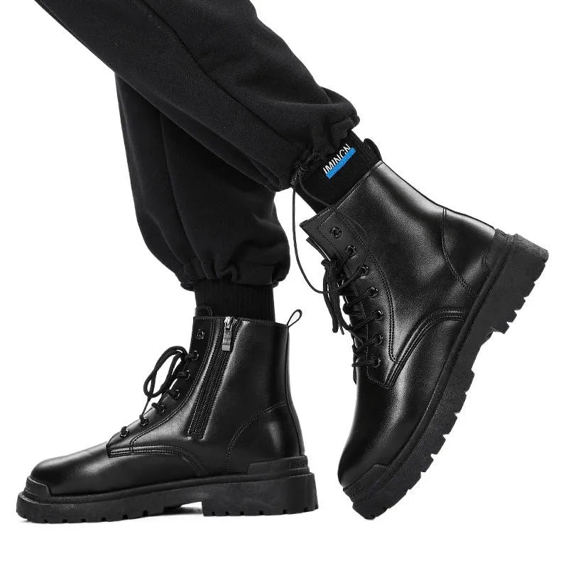 Men's black mid-top waterproof boots with rubber soles in size 42 EU