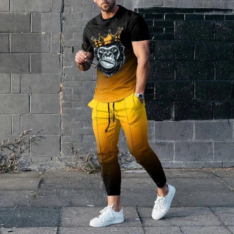 Man wearing a short-sleeved printed round neck pullover and matching trousers from a lightweight athletic suit set.