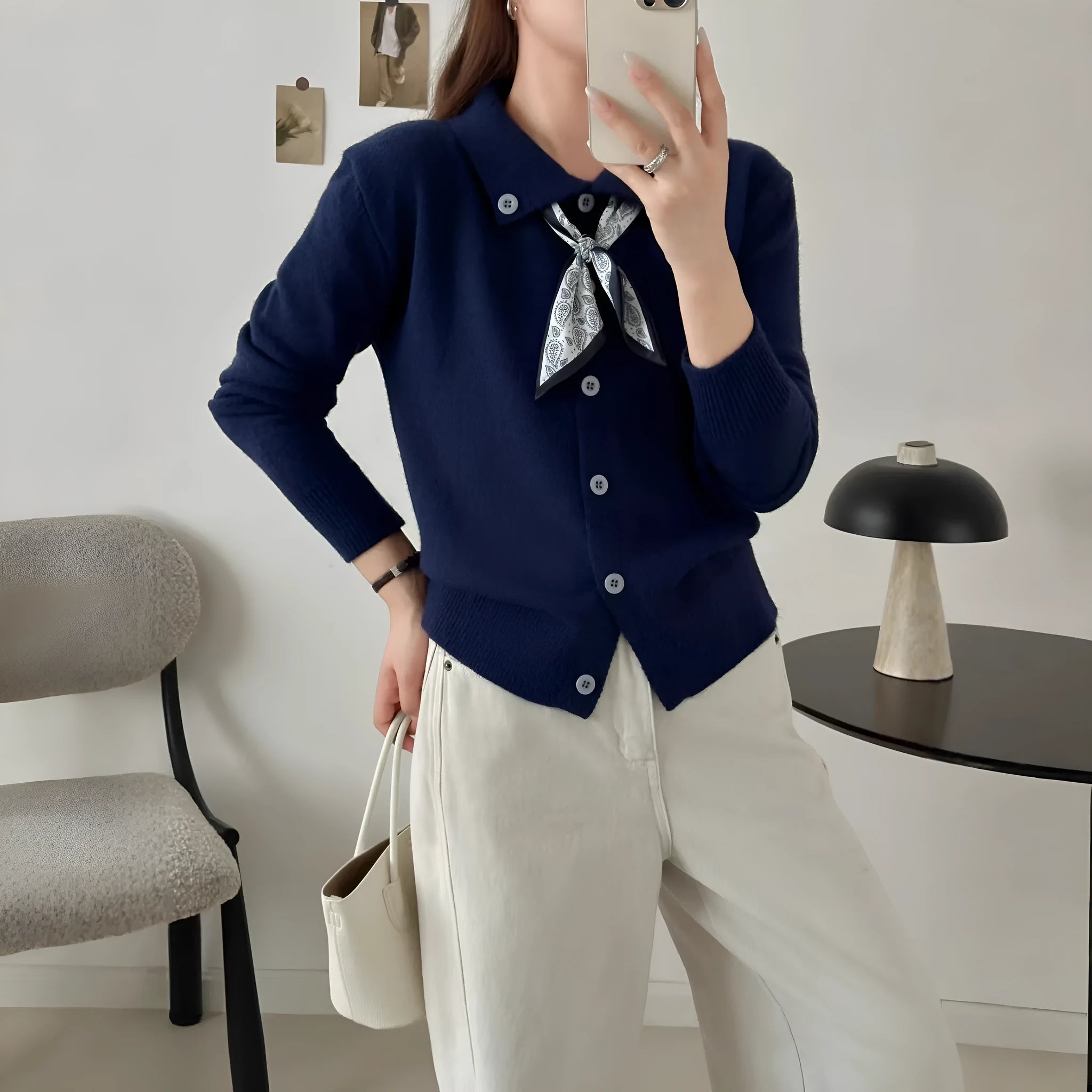 Beige lapel scarf cardigan sweater with long sleeves and splicing details on a model.