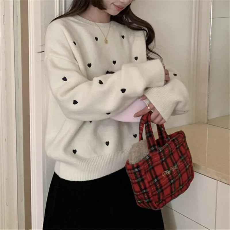Women's loose acrylic pullover sweater with love embroidery in beige, grey, or pink.