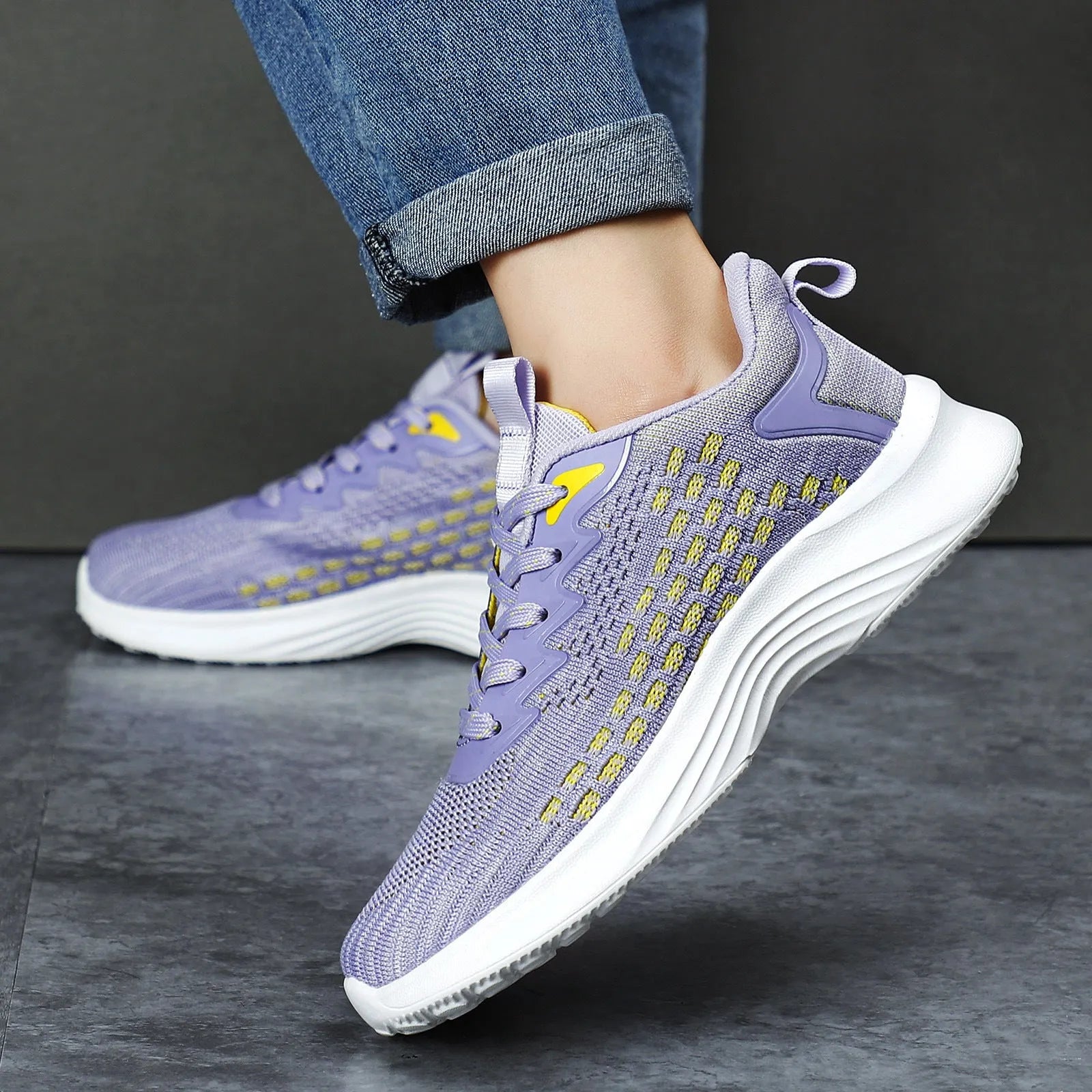 Women's lavender purple Flyknit running shoes with mesh fabric and striped pattern