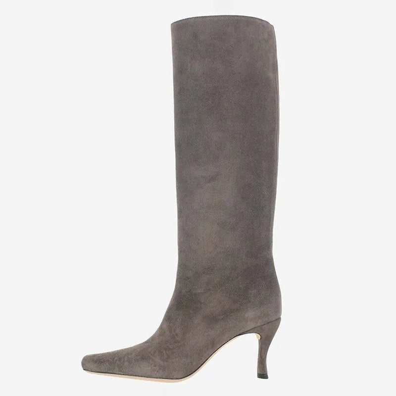 Women's square toe cowboy boot in a selection of colours including black, snake pattern, and brown stone.