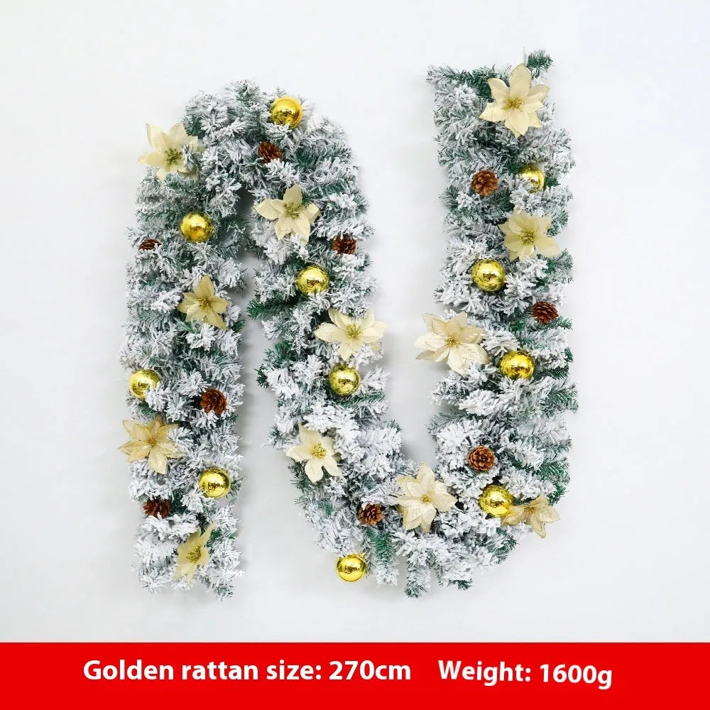 Christmas rattan garland decoration with flocked texture in five colour options displayed draped