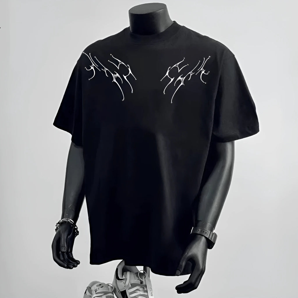 Men's black loose fit pure cotton short sleeve t-shirt with a print, laid flat.