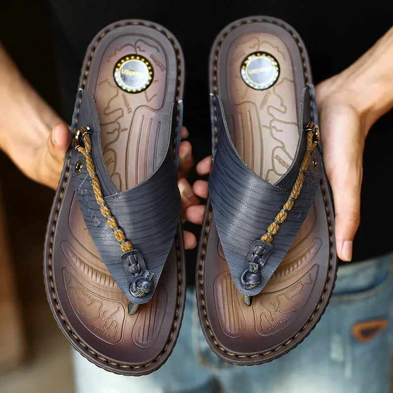 Men's dark blue herringbone-patterned outdoor slippers with a rubber sole, shown from the side.