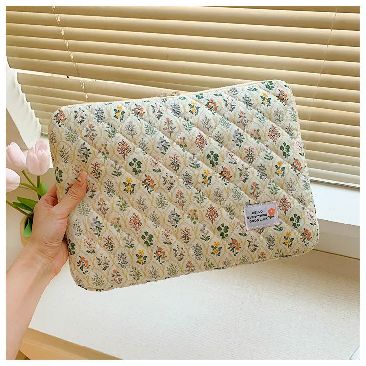 Floral print laptop bag for women in green flower pattern showing storage compartments and slim profile