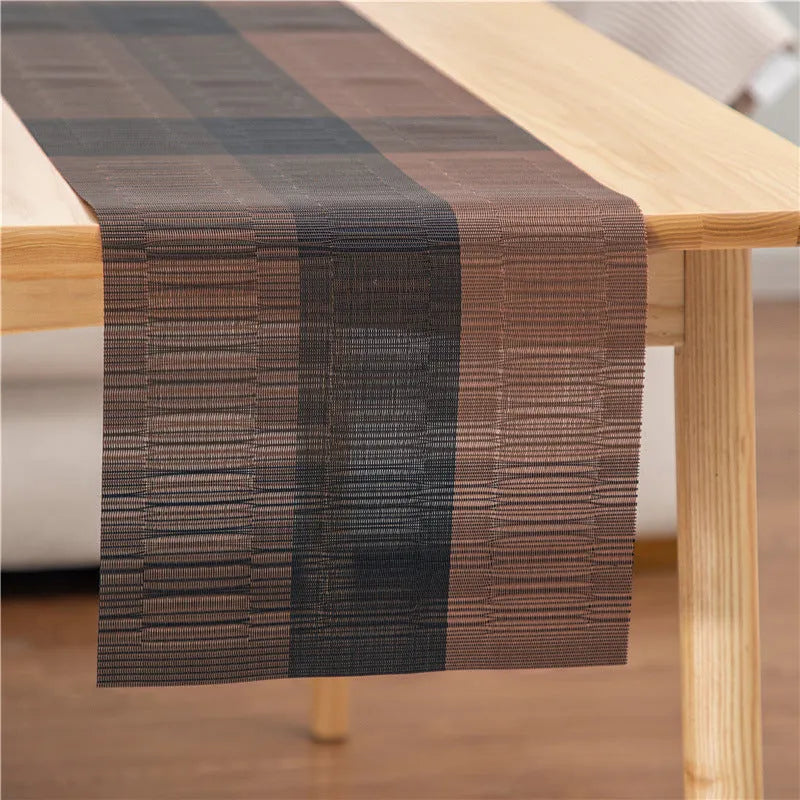 Modern PVC kitchen sink mat in a gradient bamboo colour on a countertop, showing its non-slip texture and size.