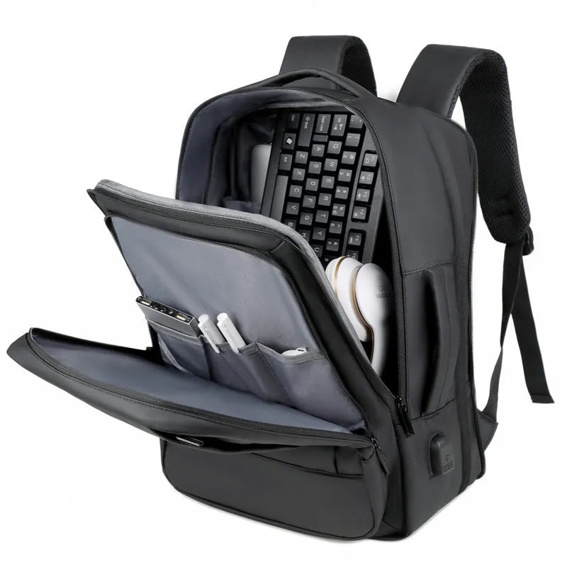 Black large capacity waterproof Oxford backpack with curved shoulder strap and hand carry handle.