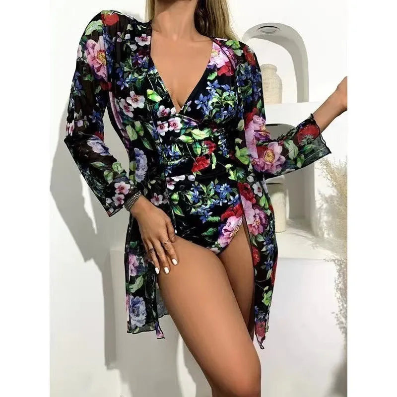 Women's floral print polyester bikini three-piece set with matching sheer cover-up coat