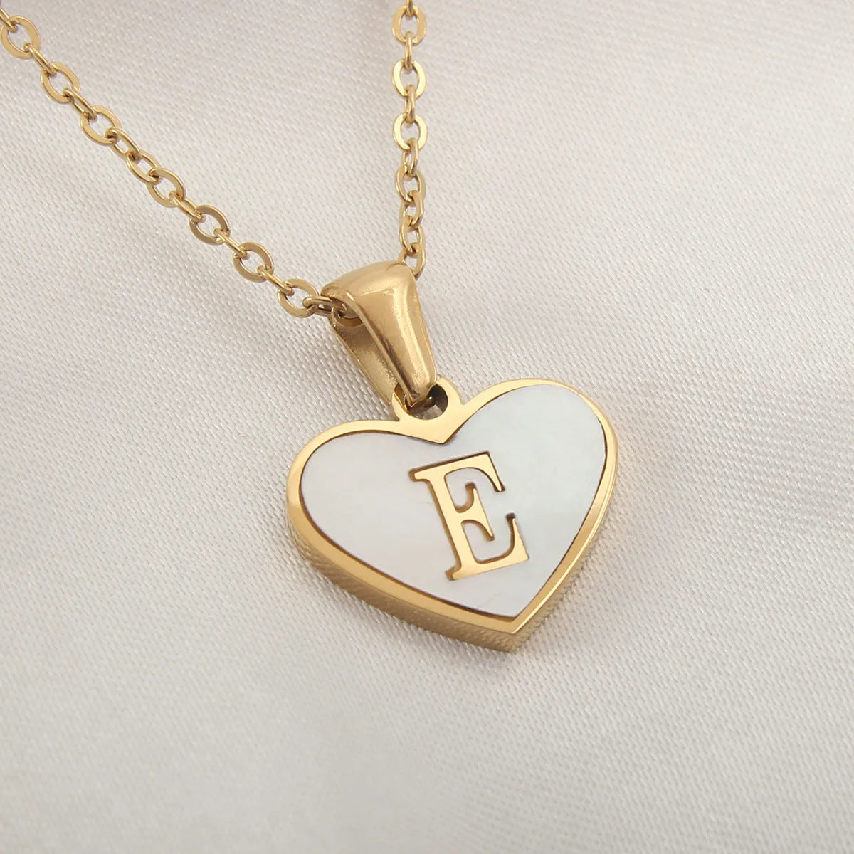 Gold plated personalised heart necklace with white shell on a 45cm chain
