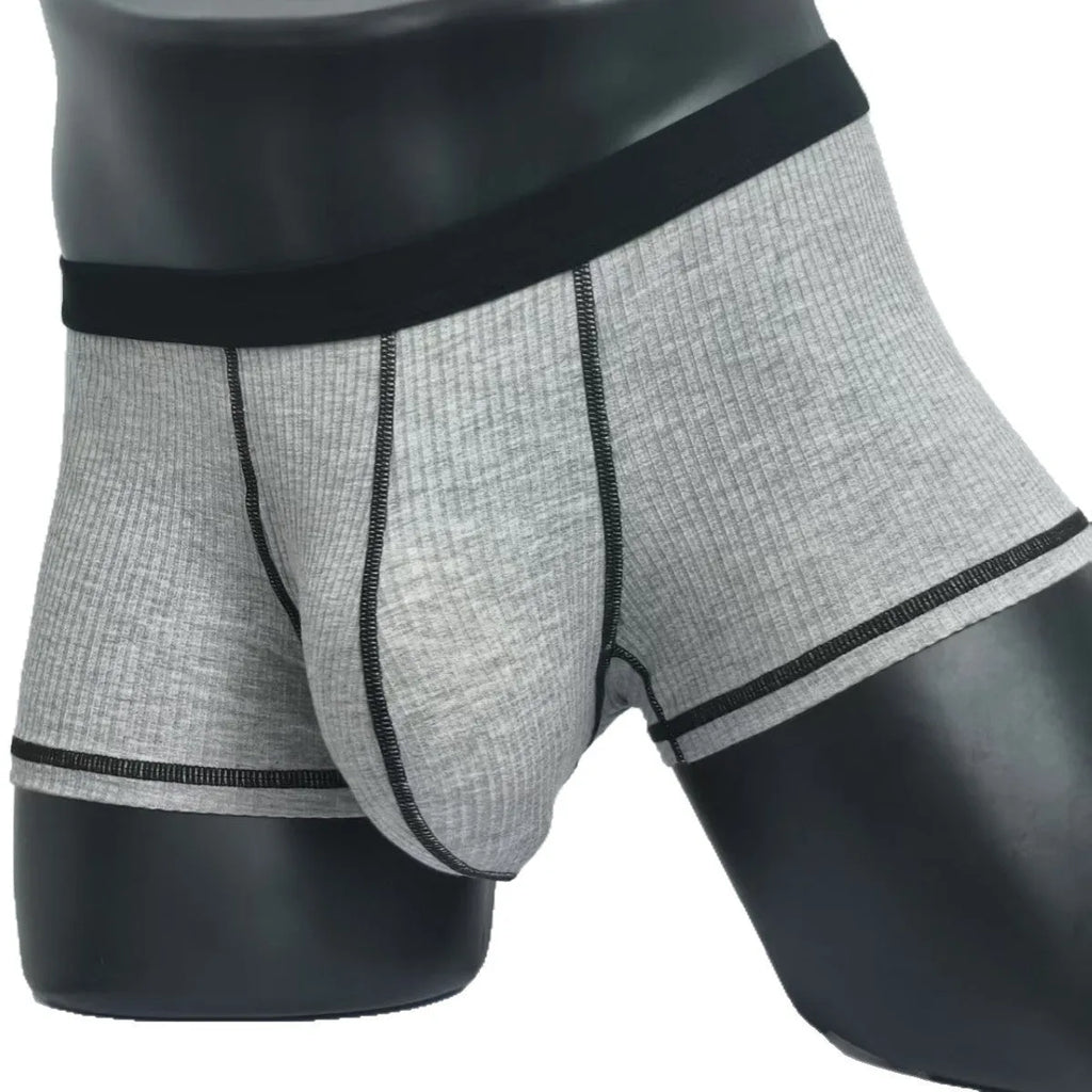 Men's thin fibre boxer shorts in army green, shown laid flat to display hip lift design.