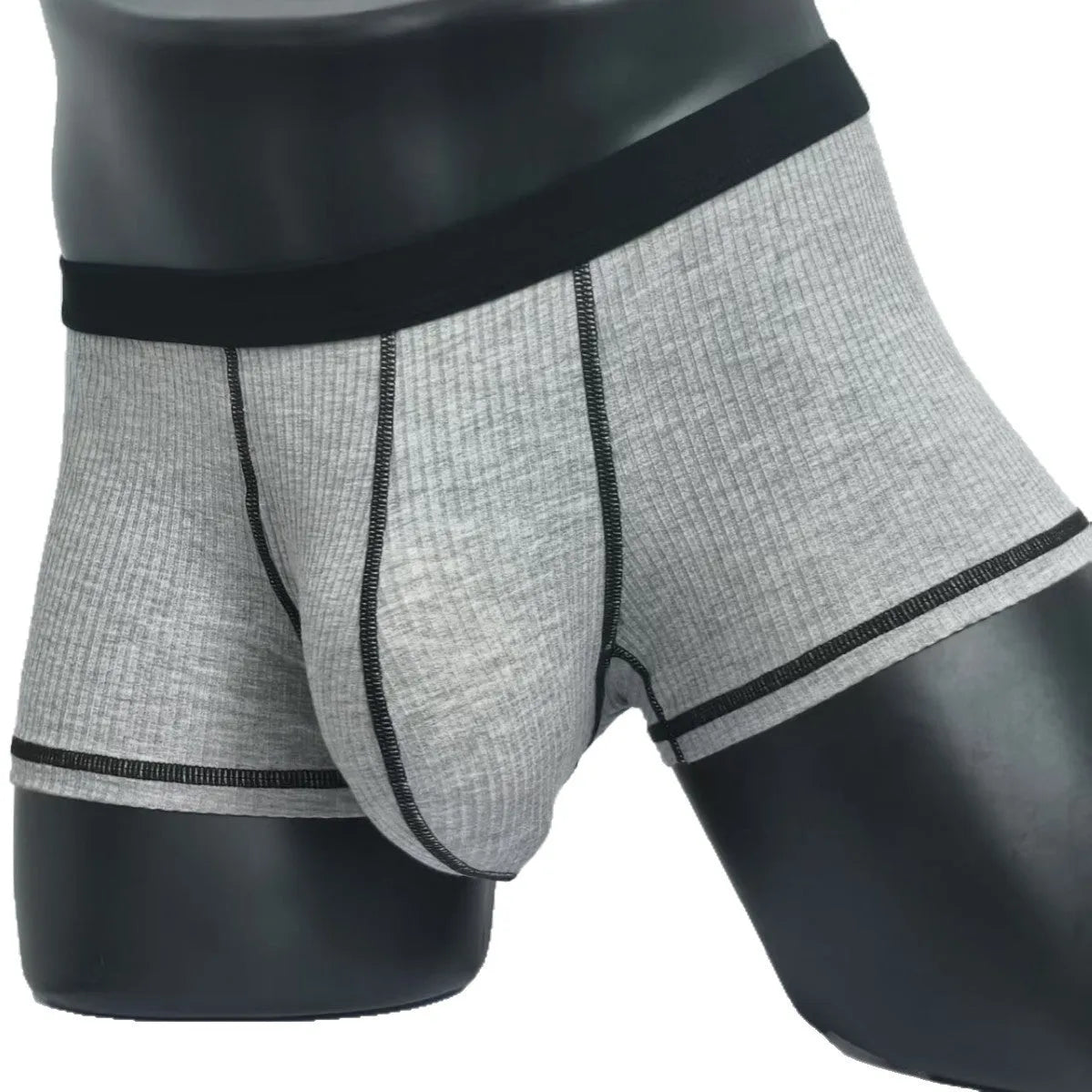 Men's thin fibre boxer shorts in army green, shown laid flat to display hip lift design.