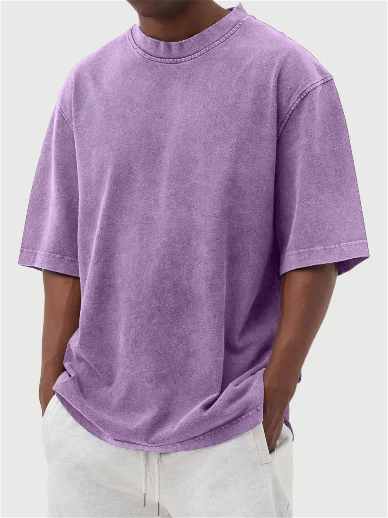 Men's loose fit distressed stone wash pullover t-shirt in solid colours like army green and blue.