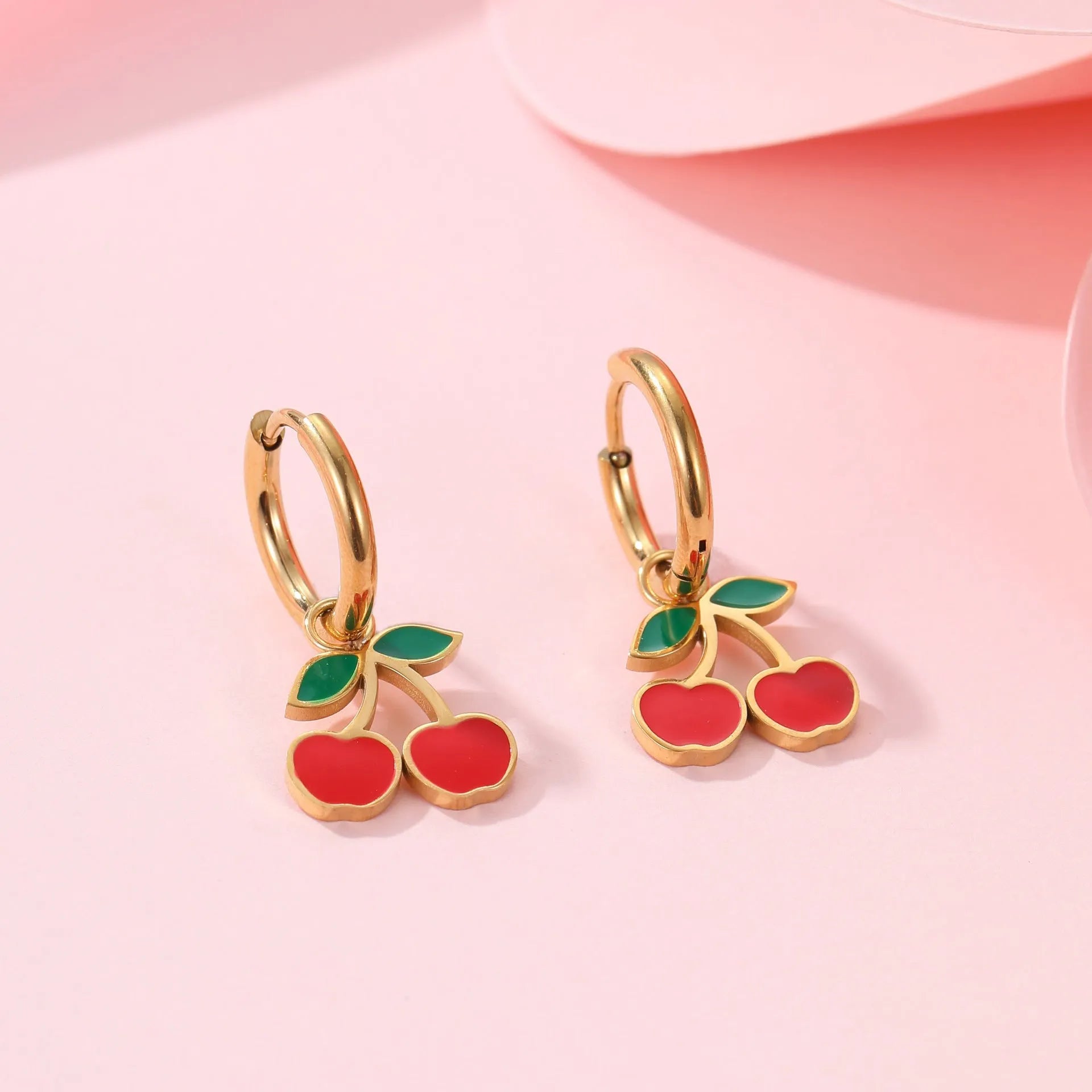 Cherry shaped jewellery set with necklace, bracelet, earrings, and ring in gold-plated stainless steel