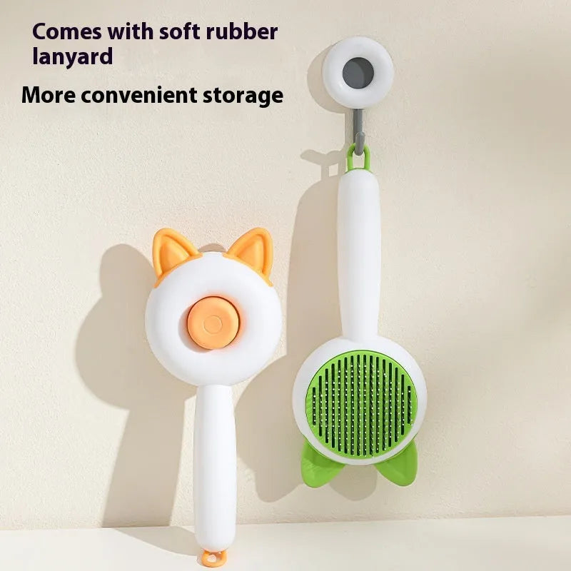 Greenish white cat grooming brush with stainless steel self-cleaning teeth and TPR massage tips