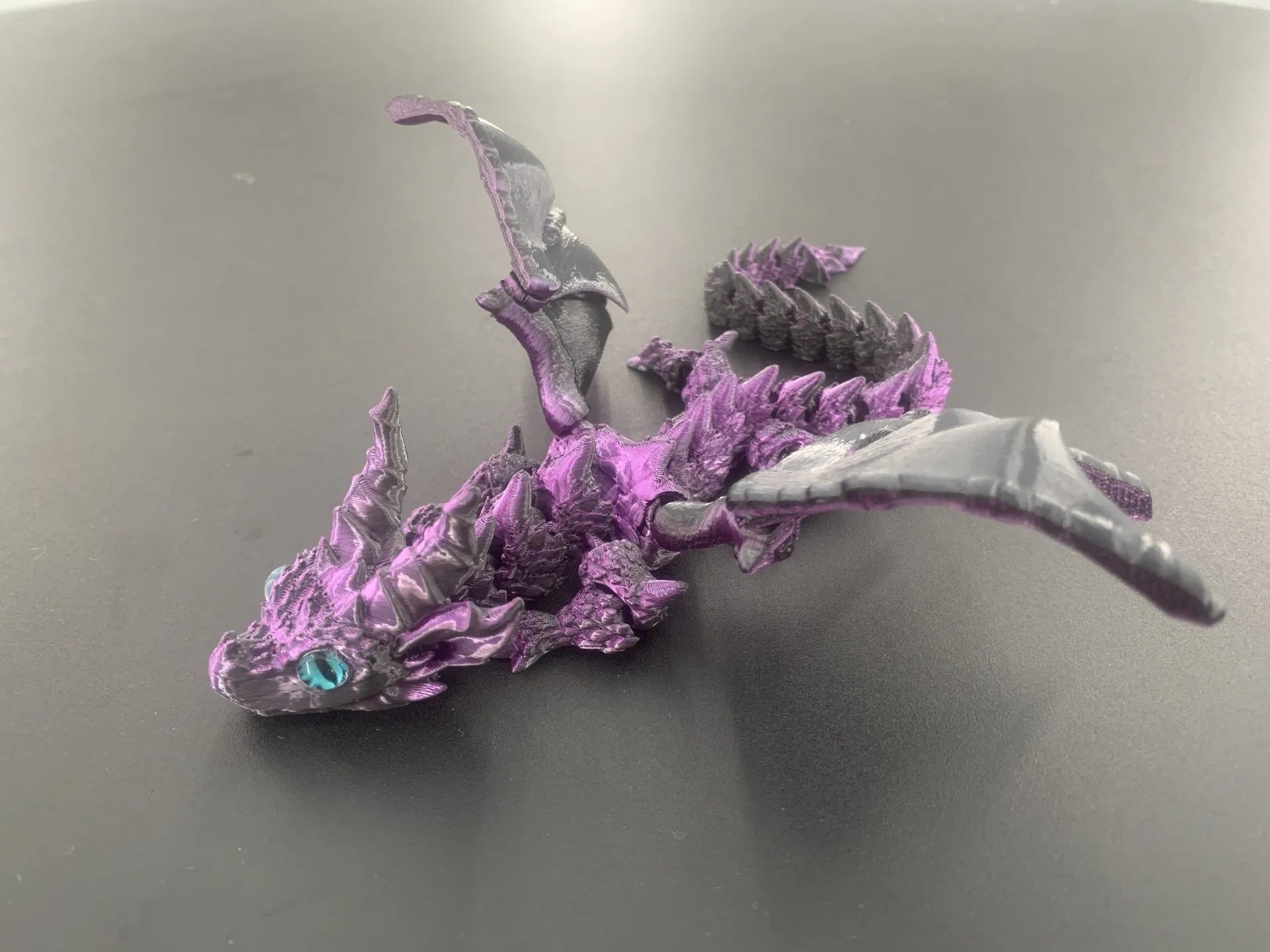 PLA plastic flying dragon wing decoration measuring 25x16x3cm in multiple colour finishes