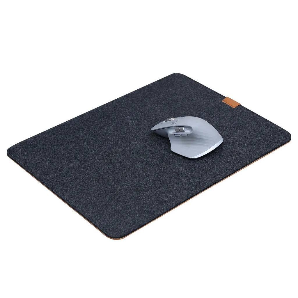 Oversized felt and cork office mouse mat showing black grey colour option on desk