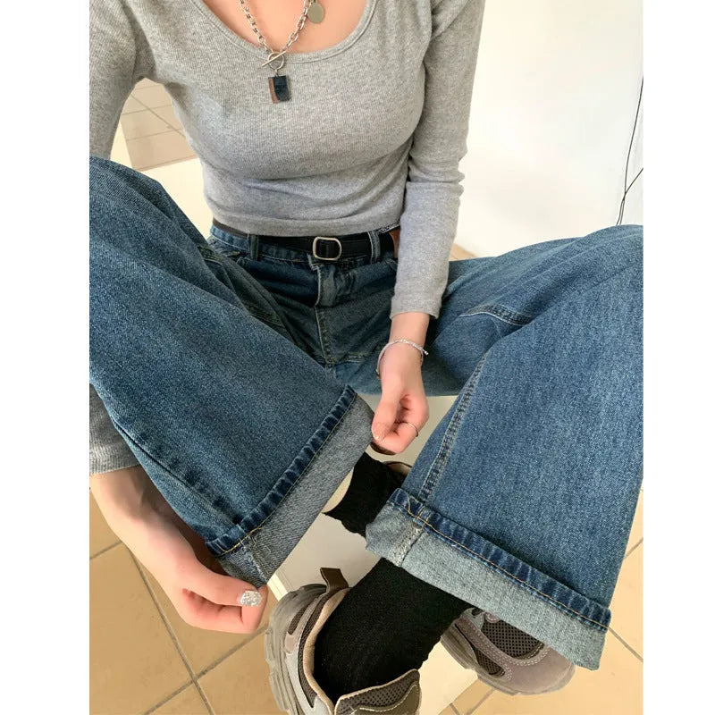 Women's straight-leg jeans in retro blue with high waist design and classic denim construction