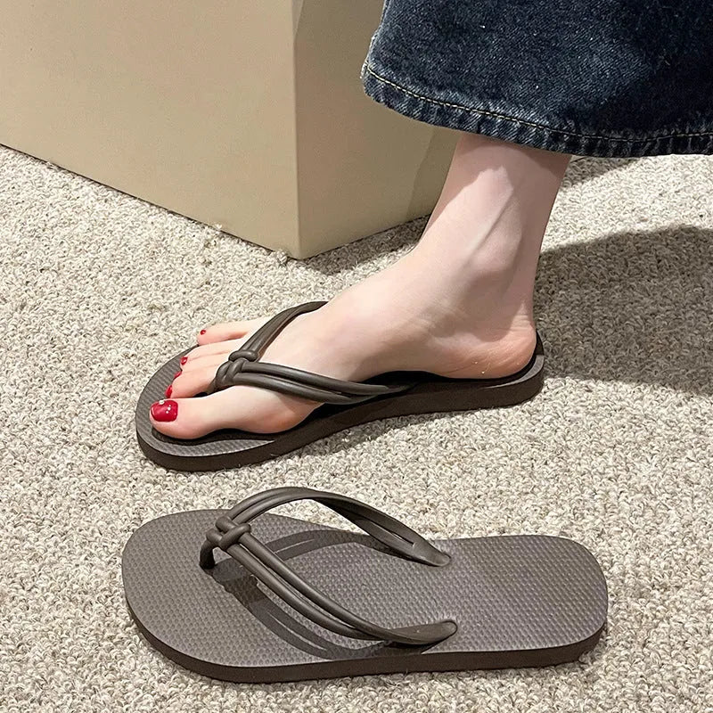 Men's closed-toe PVC flip flops in multiple colours on a plain background.