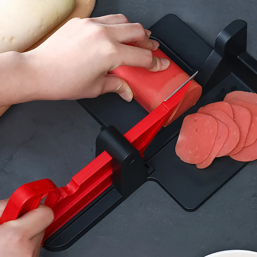 Green plastic vegetable cutter with stainless steel blades for cutting carrots and potatoes