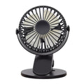 White USB rechargeable brushless clip fan attached to a desk edge