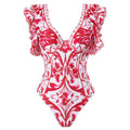 Women's printed polyester one-piece swimsuit available in multiple colours and styles