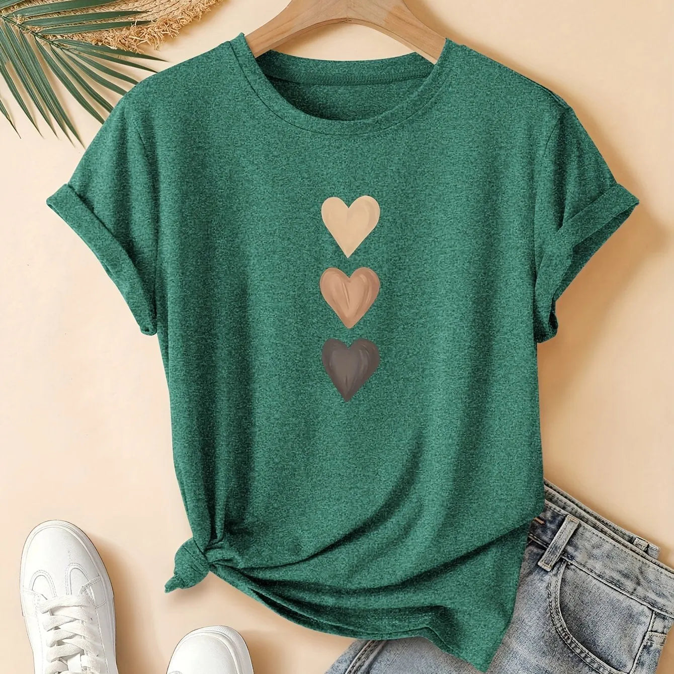 Women's art retro style printed cotton short sleeve T-shirt on a hanger.