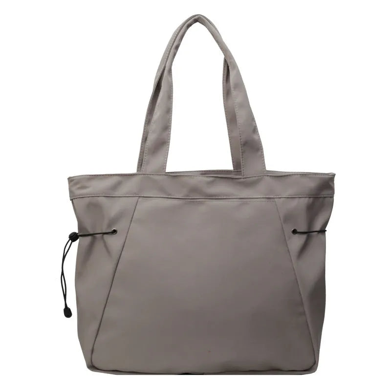 Soft Oxford cloth folding shoulder tote bag shown in available colour options