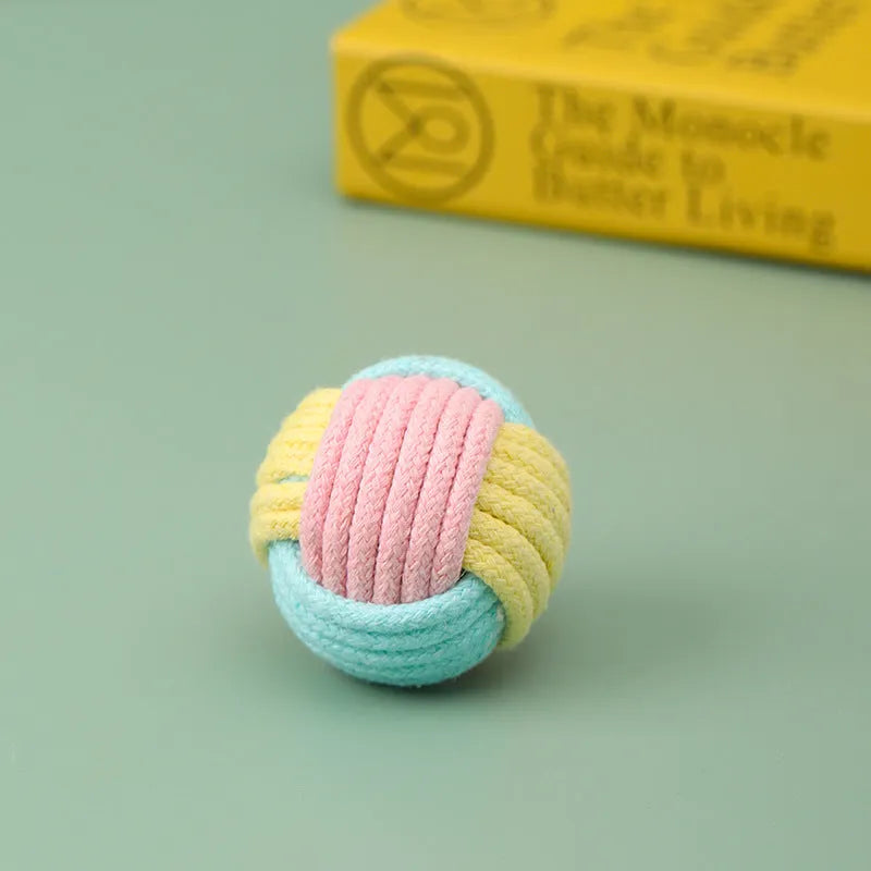 Handmade blue powder and green cat hair ball plush cotton toy for pet teeth grinding.