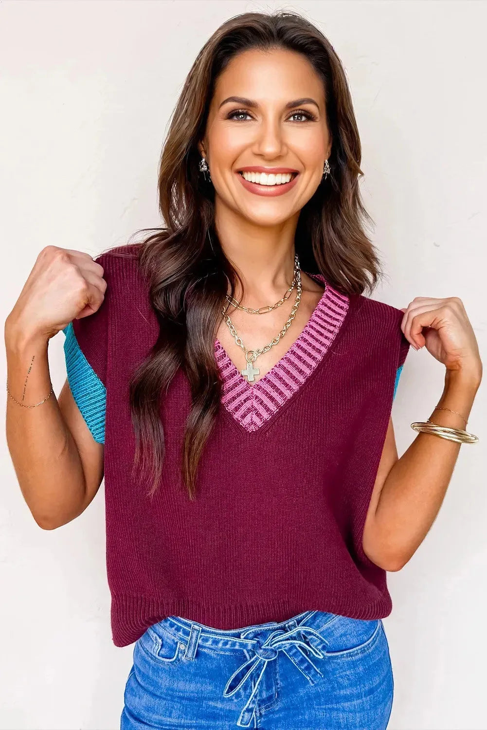 Burgundy loose-fitting V-neck sweater with contrast trim and cuffed short sleeves