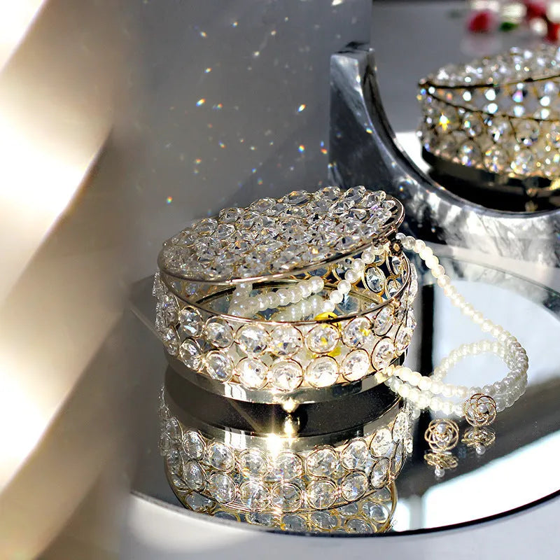 French gold metal frame jewellery box with transparent crystal glass panels displaying contents