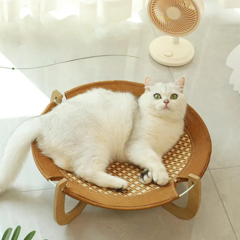 Brown woven rattan pet hammock bed measuring 46cm square with off-ground design