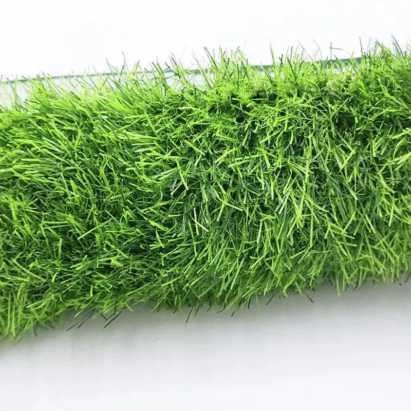 Artificial grass dog toilet training mat on a floor, shown in small, medium, and large sizes.