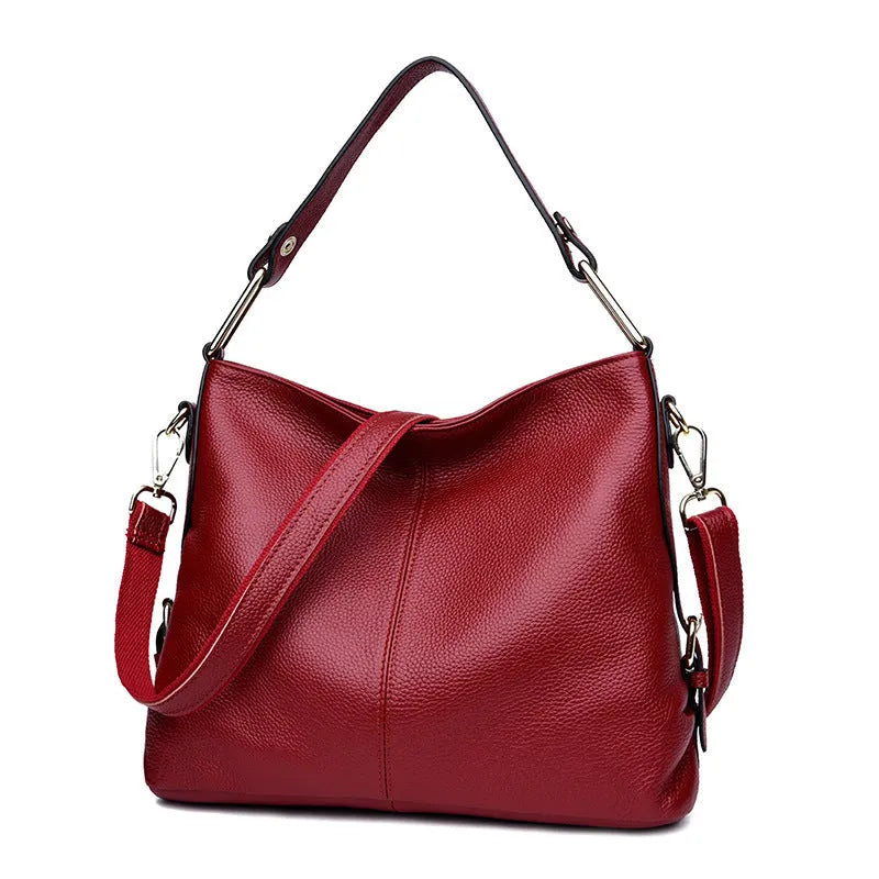 Genuine leather vertical square crossbody bag showing internal phone and document pockets