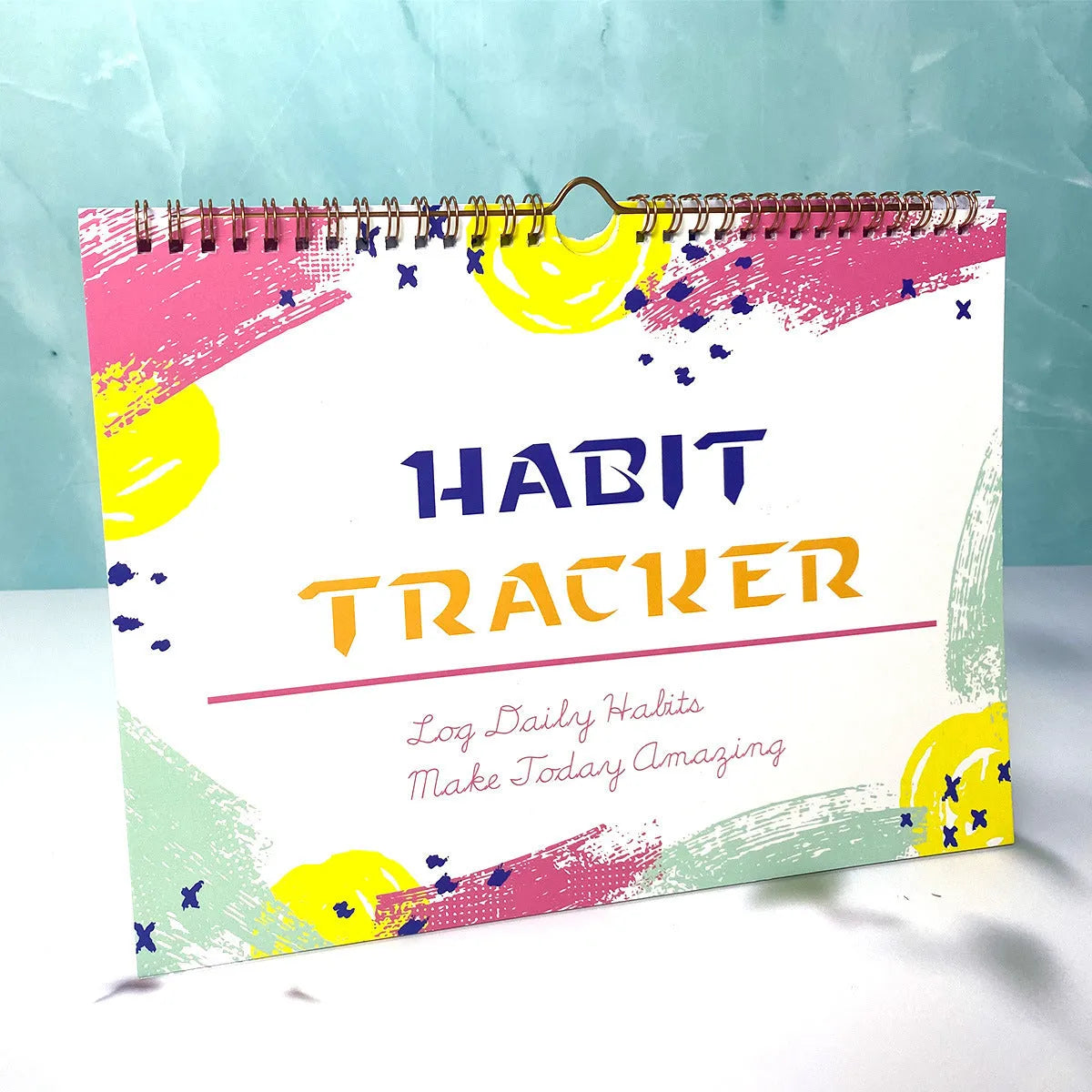 English habit tracking planner with 12 pages in pink white, purple white, flower white or yellow white covers