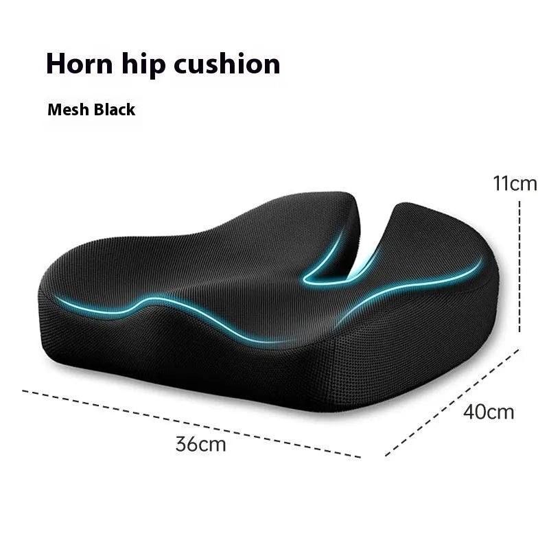 Dark grey memory foam office chair cushion for waist support, shown on a desk chair.