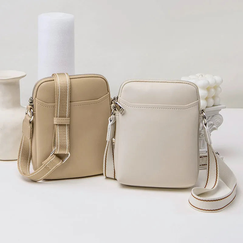 Solid colour simple PU crossbody shoulder bag for mobile phones in black, beige, khaki, or green.
