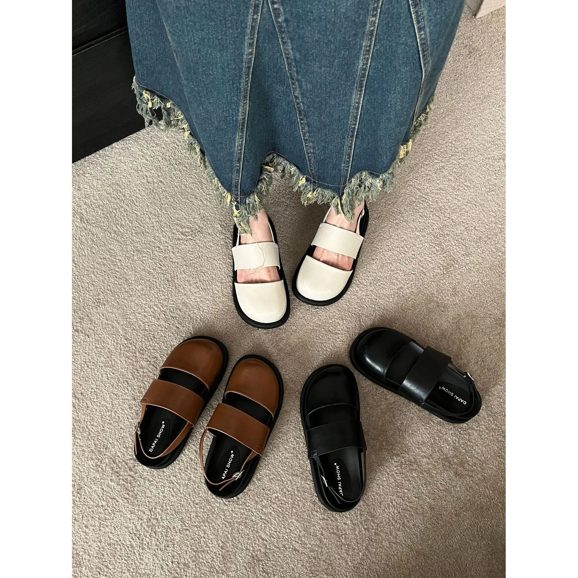 Retro closed toe sandals with raised bottom, ankle strap buckle, and round toe in apricot colour