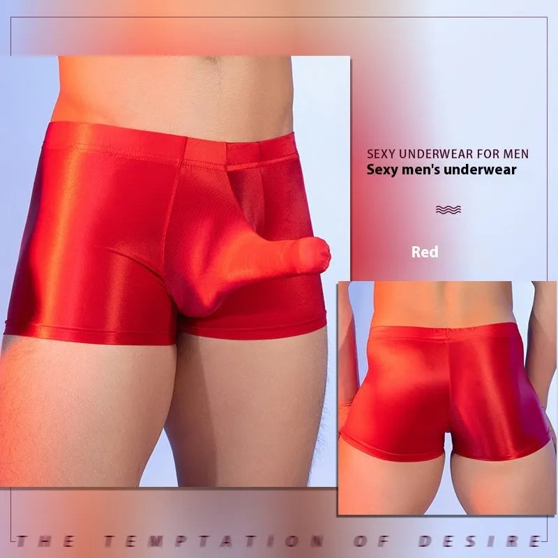 Red men's nylon boxers with an elephant nose design on a mid waist.