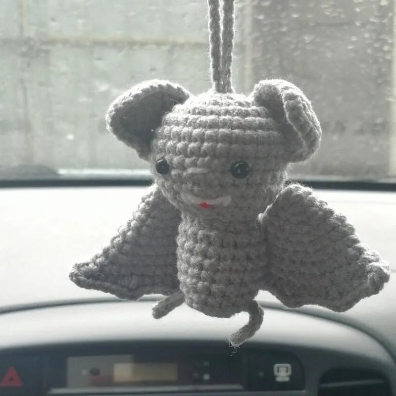 Plush hand-woven car hanging ornament in a cartoon design made from polyester