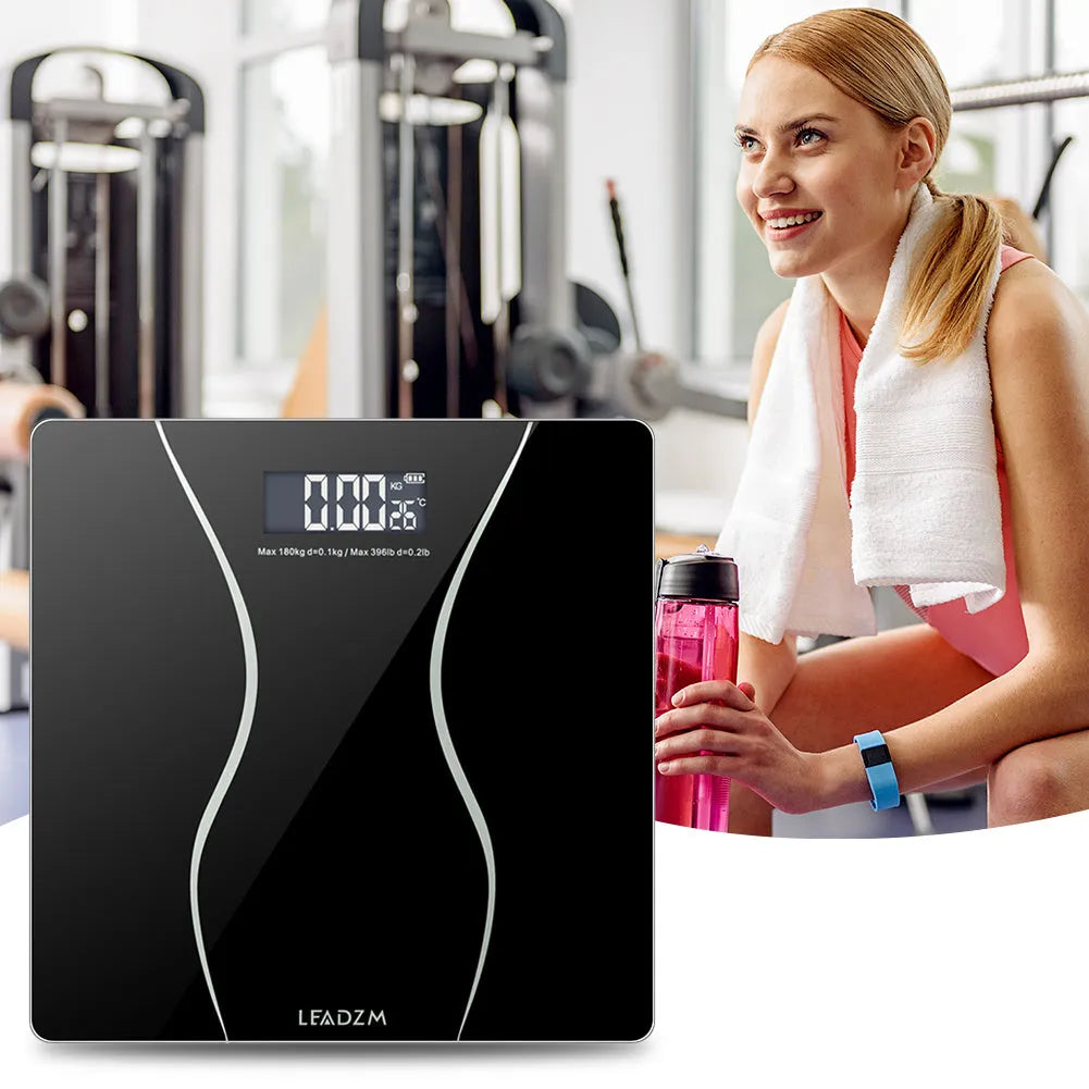 Black electronic bathroom scales with digital display for household weight measurement up to 180kg