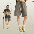Men's batik washed cotton terry shorts in loose retro style with patchcraft colour effects