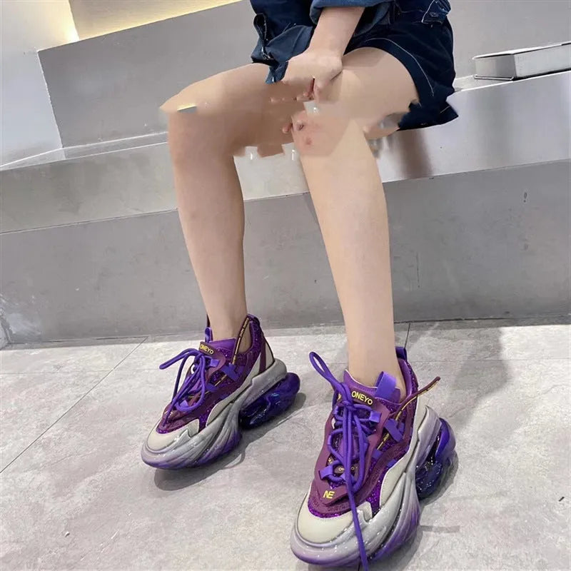 Women's leather casual sports shoes with thick jelly sole and cross-tie design in assorted colours.