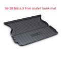 Custom rubber floor mats for Tesla cars with a textured TPE driver footrest section.
