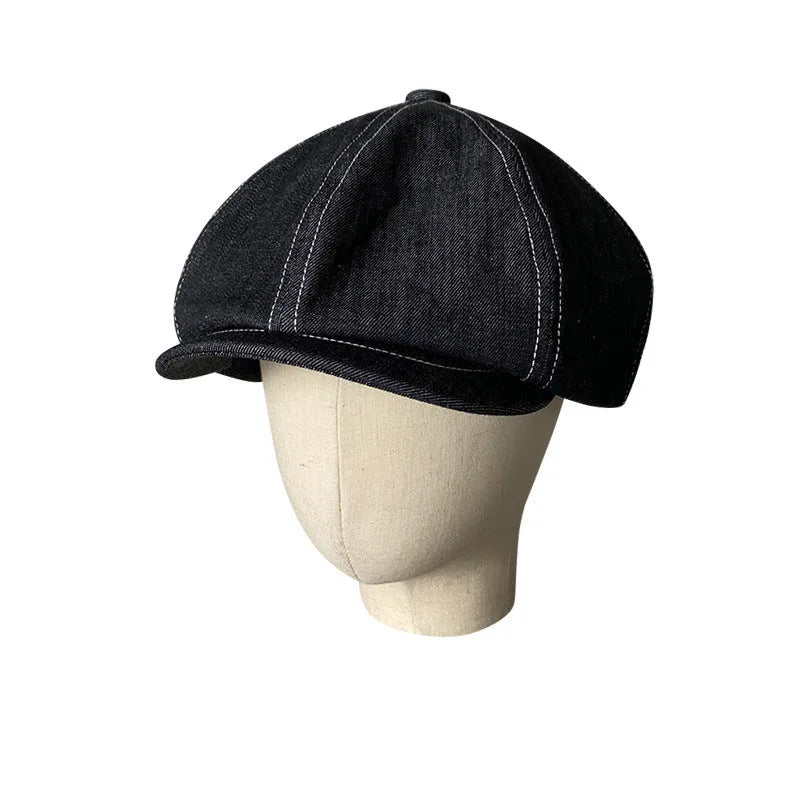 Black Japanese denim fabric beret hat shown in three adult sizes