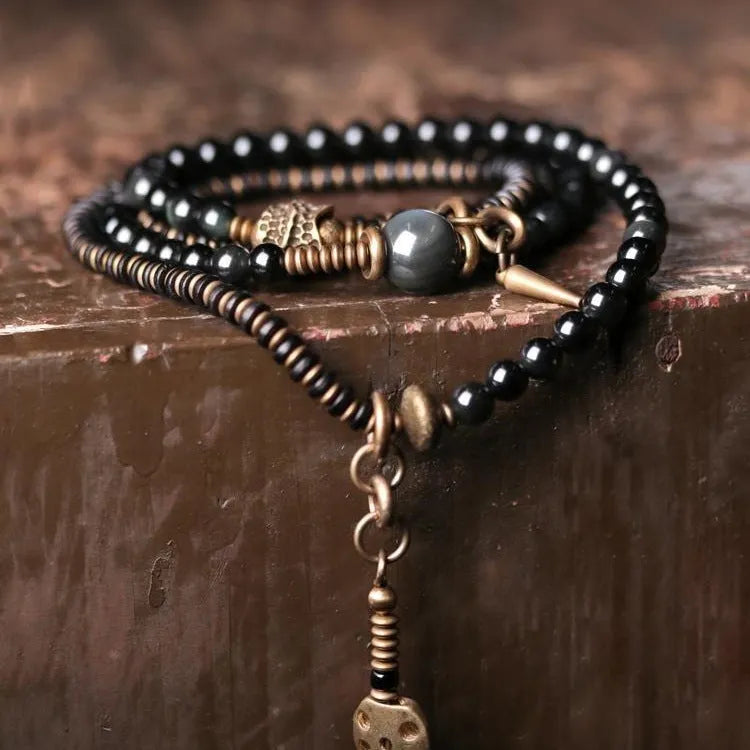 Black geometric stone bead bracelet with multi-layered design and colourful retro styling