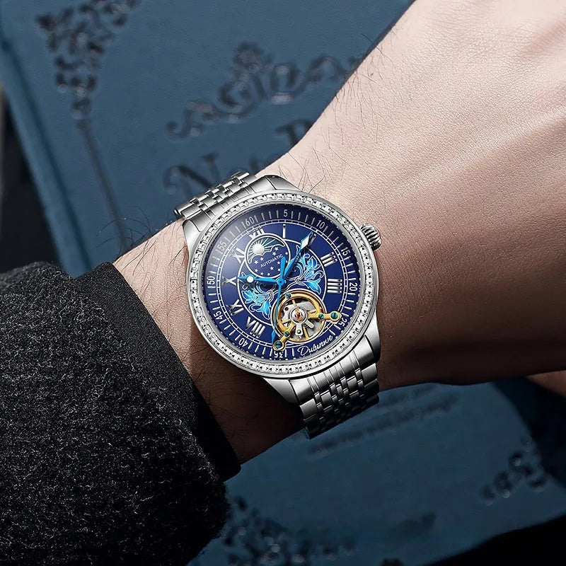 Men's stainless steel waterproof mechanical watch with round dial and butterfly clasp on wrist