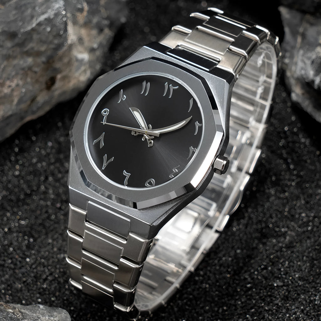 Men's steel bracelet quartz watch in business style on a wrist.