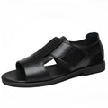 Men's black and brown open-toe leather casual sandals with rubber soles.