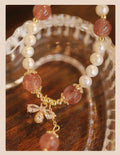 Strawberry quartz crystal bracelet with bow detail and stringed pearls for women